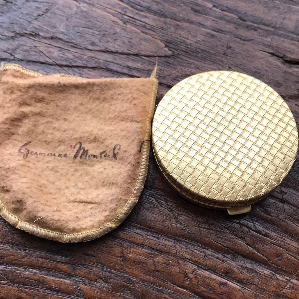 Vintage gold powder compact by Germaine Montiel